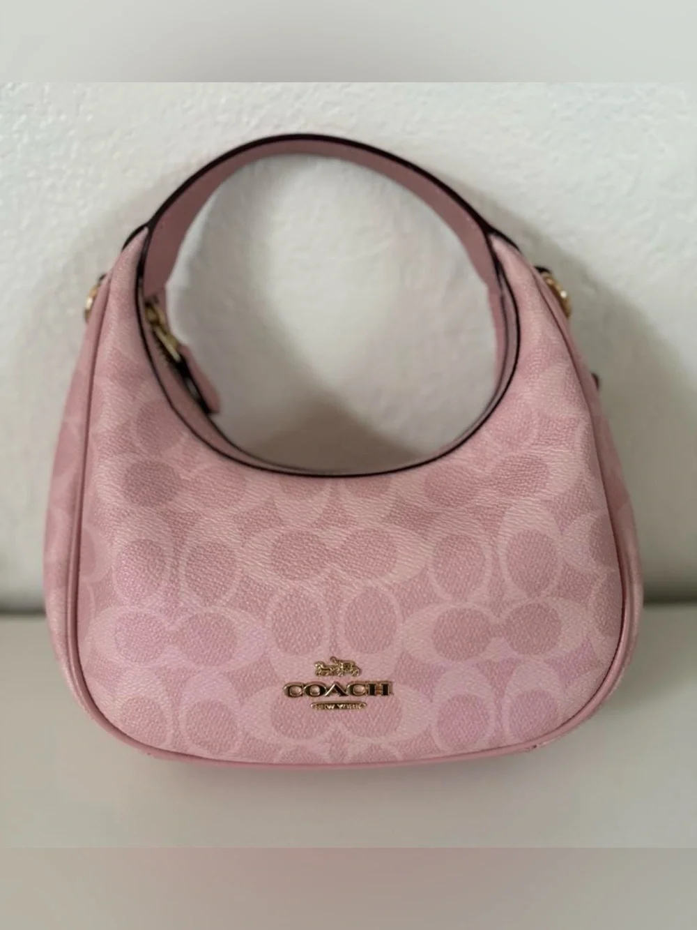 Pink coach purse with crossbody chain